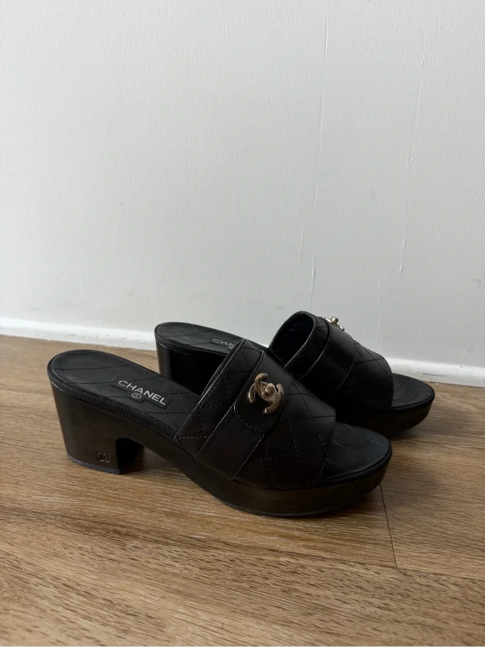 CHANEL Black Quilted Leather Slide Mules